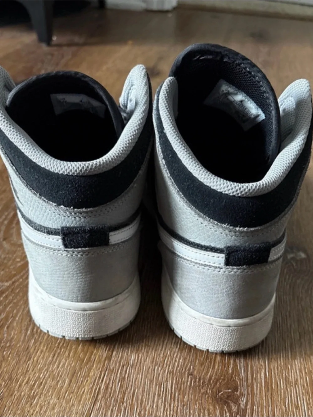 Jordan Black, Gray, and Red High-Top Sneakers
